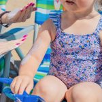 Ortley Beach vacation rentals - sunscreen being applied to childs arm
